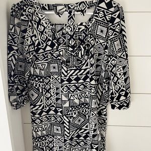 Apricot lane dress. Hits mid thigh. Beautiful bow detail on the back